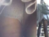 パンチラ盗撮 女子大生 レース付きの白い水玉パンツが黒パンストから透けて丸見え